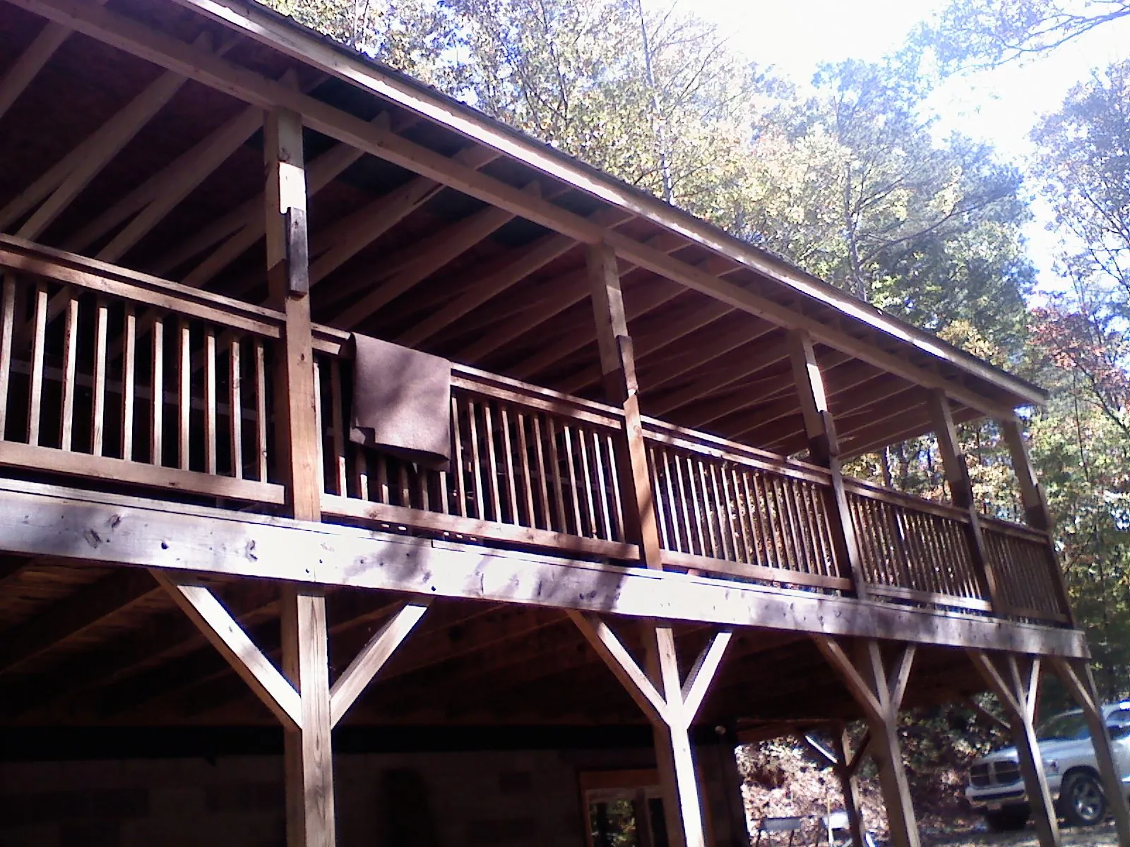 Timber framing under a new elevated porch and deck — Roof Leak Repair in Pierre Part by Roofing Brothers